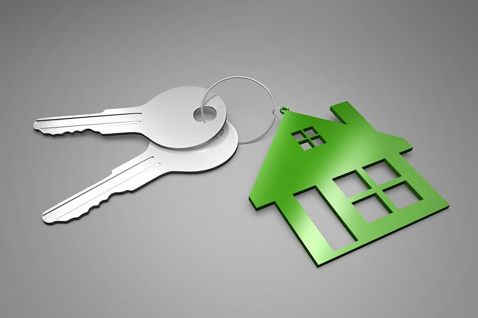 Image of a house-shaped keyring with keys, representing the need for the closure gained through probate and how contesting a will in Ohio can complicate that process.